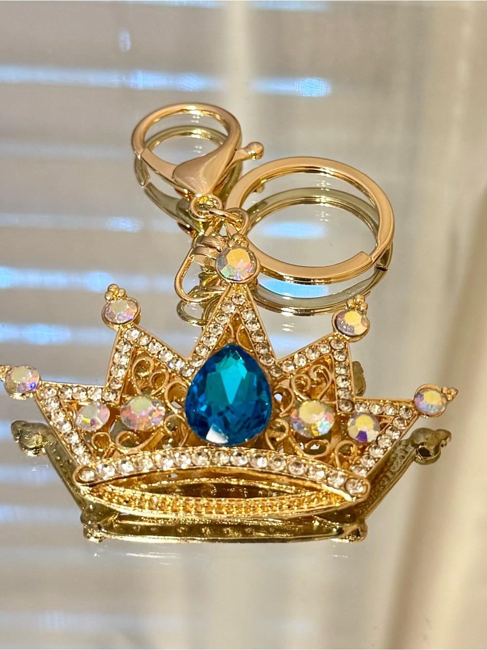 New Gold Crown Keychain with Blue Teardrop Gem
